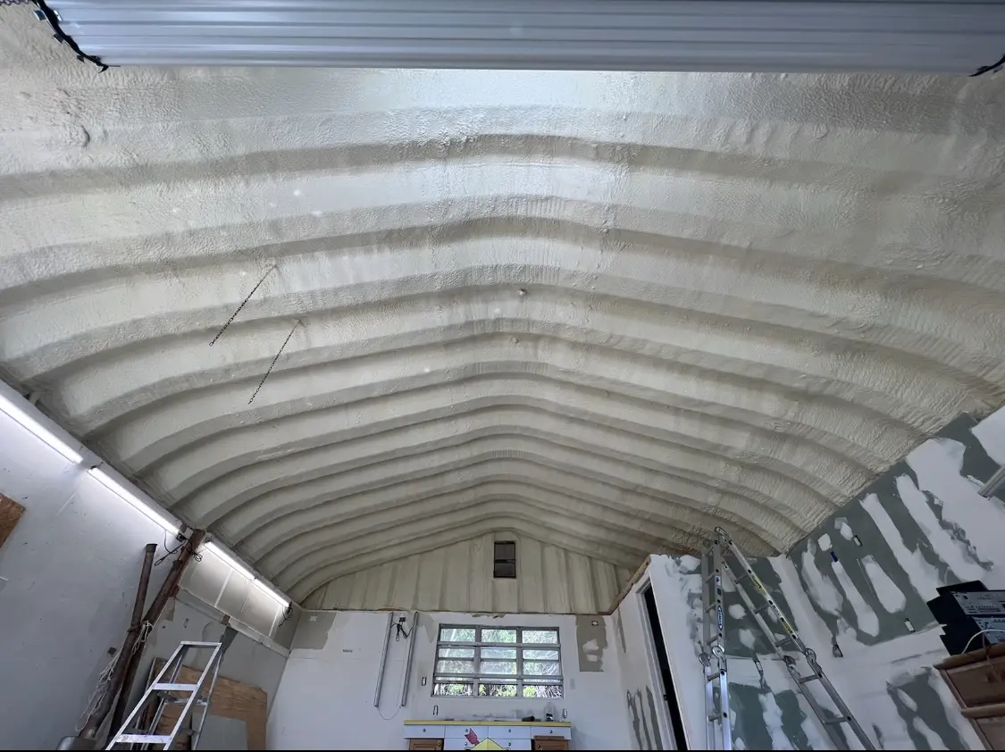 Spray polyurethane foam applied to the underside of a metal roof deck in East Vincent