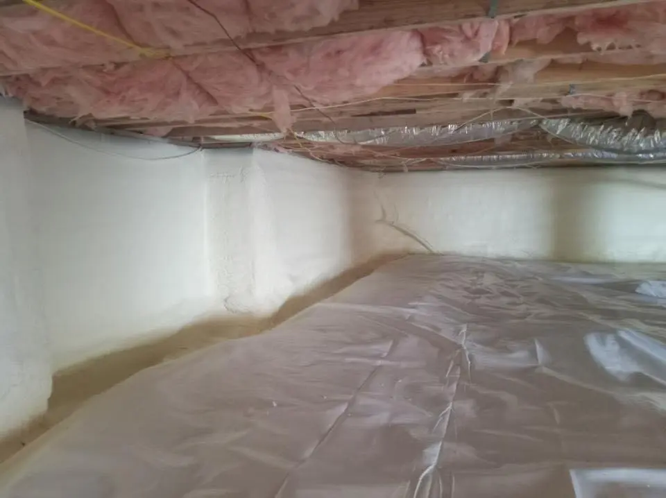 Crawl space encapsulation with closed-cell spray foam for Storm Damage Roof Repair in East Vincent